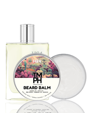 Beard balm packaging with a scenic label on a white background