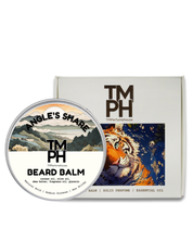 Beard balm container with 'TM PH' branding and a tiger illustration on the packaging.