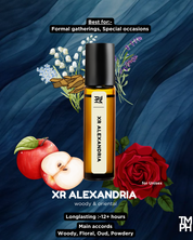 Perfume bottle with floral and fruit elements on a blue background