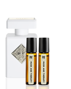 White perfume bottle and two brown roller bottles labeled 'Musk and Therapy' on a white background