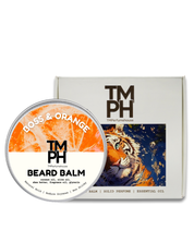 Beard balm container with 'TM PH' branding and a tiger illustration on the packaging.