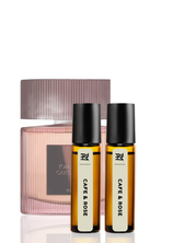 Two perfume bottles labeled 'Cafe & Rose' by Tom Ford on a white background