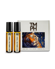 Two bottles of 'Cool Waters & Sea' solid perfume with a box featuring a tiger illustration on a white background.