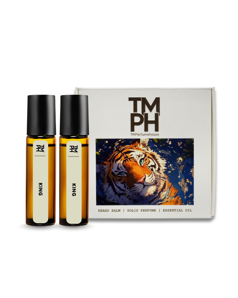 Two amber glass bottles with black caps and a box featuring a tiger illustration on a white background.