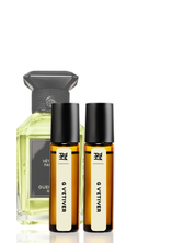 Collection of Guerlain vetiver fragrances on a white background