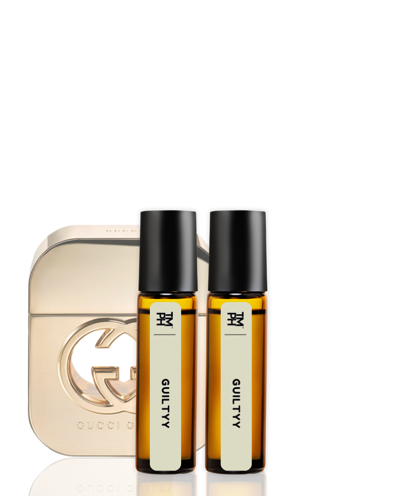 Two Gucci perfume bottles with a Gucci eau de toilette bottle on a white background