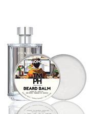 Prada eau de toilette bottle with a container of Timph beard balm on a white background