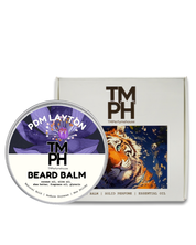 Beard balm container with tiger design and 'TM PH' branding on a white background