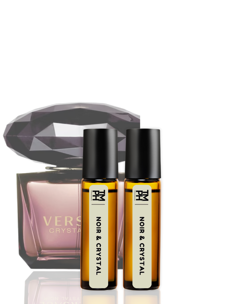 Two bottles of Noir & Crystal perfume with a Versace crystal case on a white background